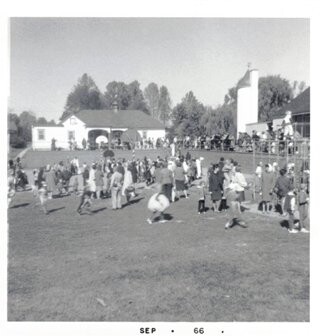 Crowd gathered on the Ayrlawn Elementary School field for a Halloween parade, September 1966